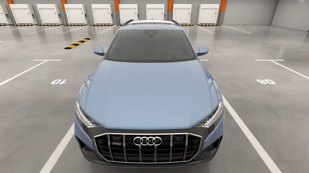 The AI security camera's view of a parked car in a garage bay