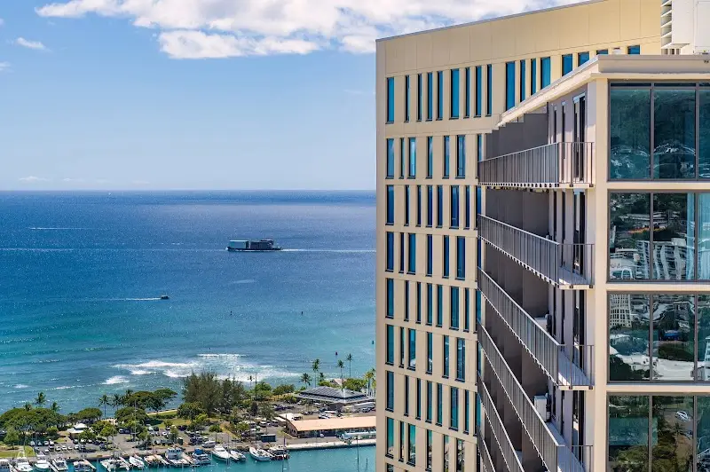 High-rise residential tower beside the ocean